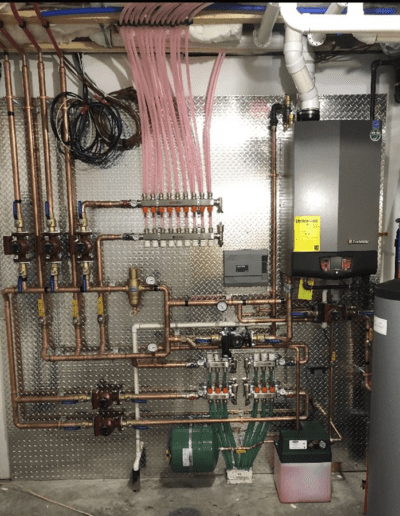 wall with plumbing pipes